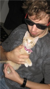 Me holding a cute, cuddly, kitten cat.
